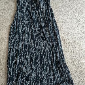 Black maxi skirt with white embroidered flower and vines size: M